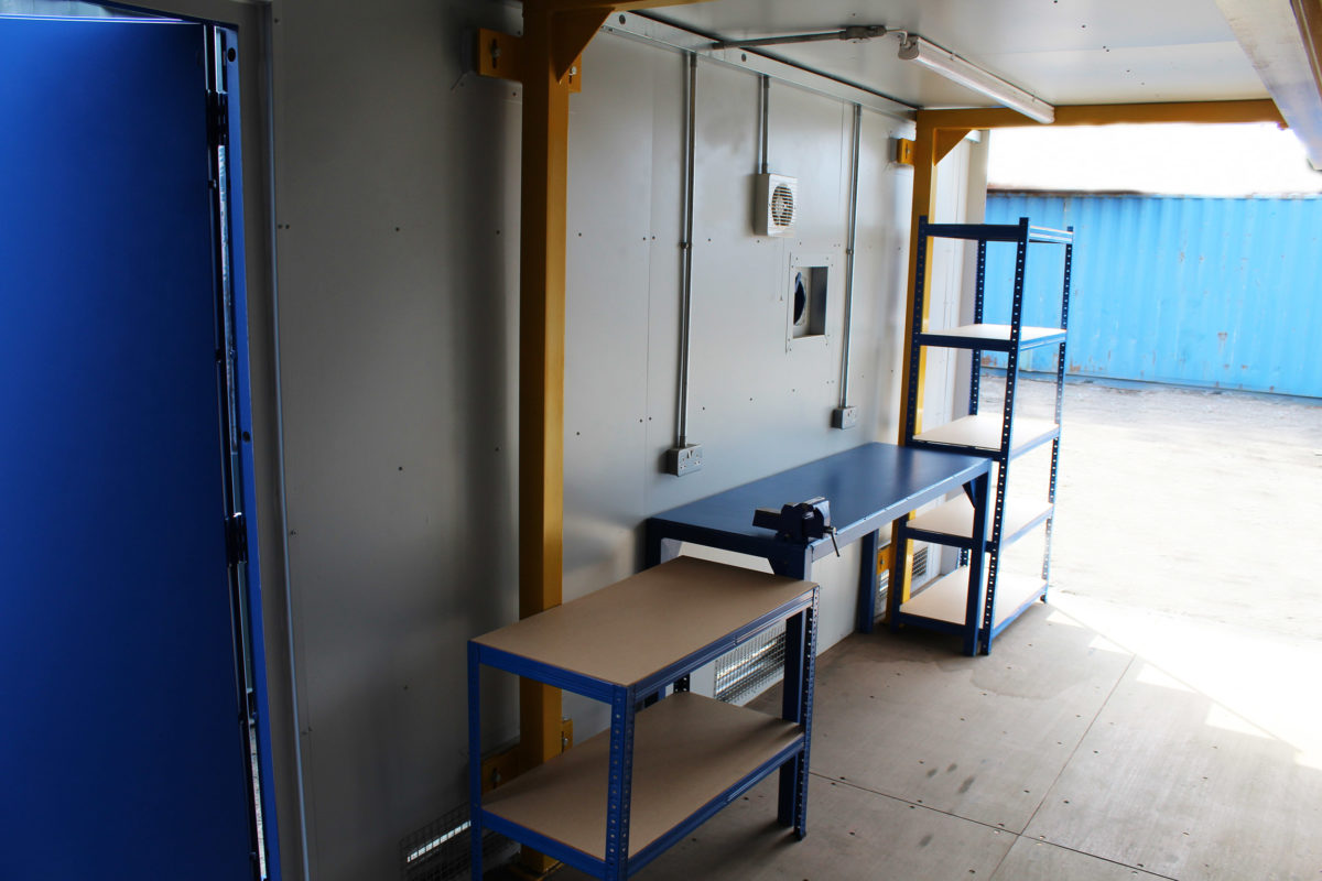 container conversion workshop with shelving